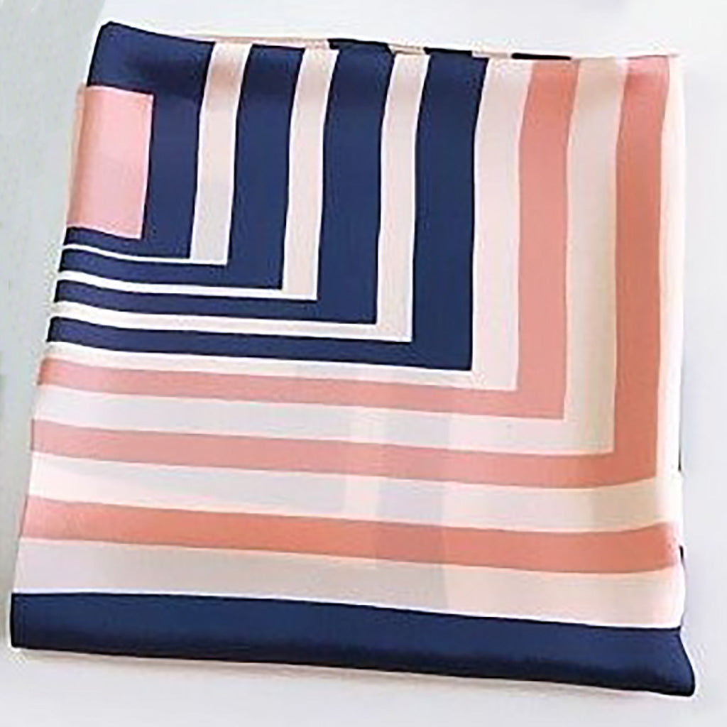 Navy and pink square silk scarf, versatile and easy to style, essential accessory for the modern woman seeking timeless pieces with a contemporary edge
